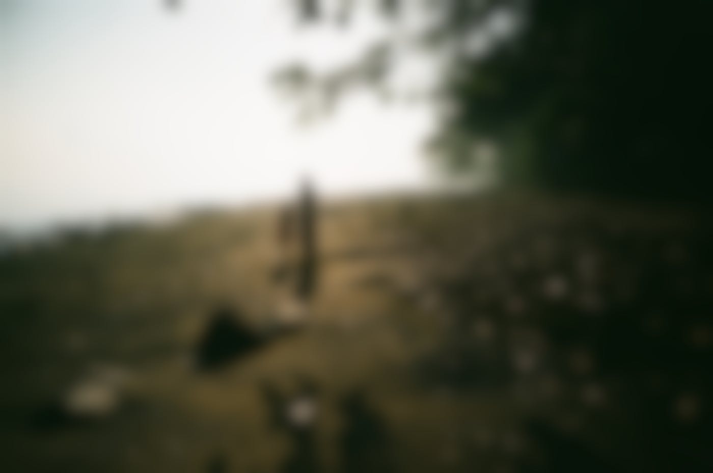 A mother walking by the water with her daughter