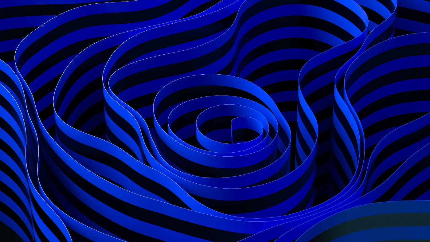 a swirling blue and black background image