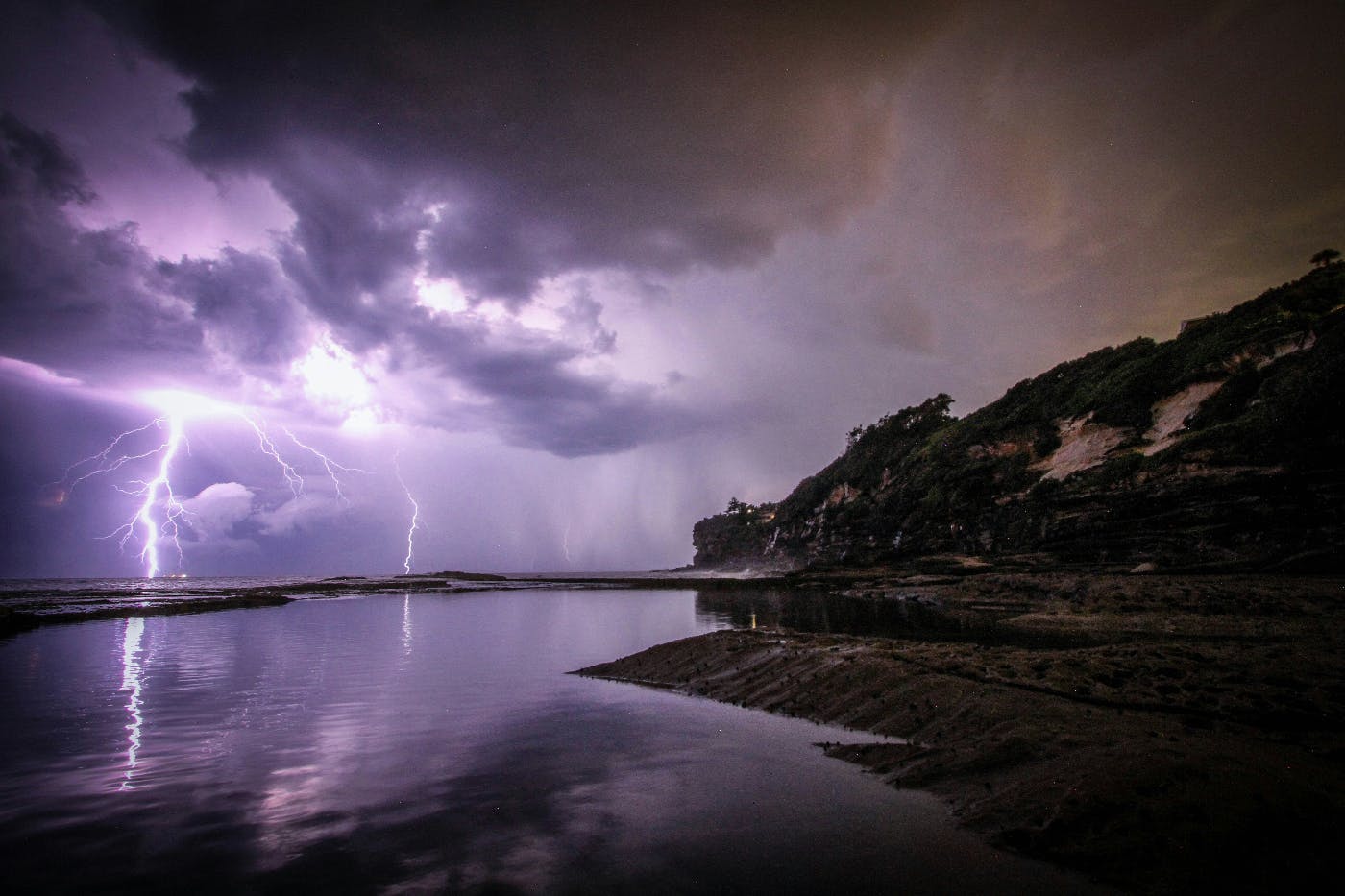 A storm over the sea with lightning strikes