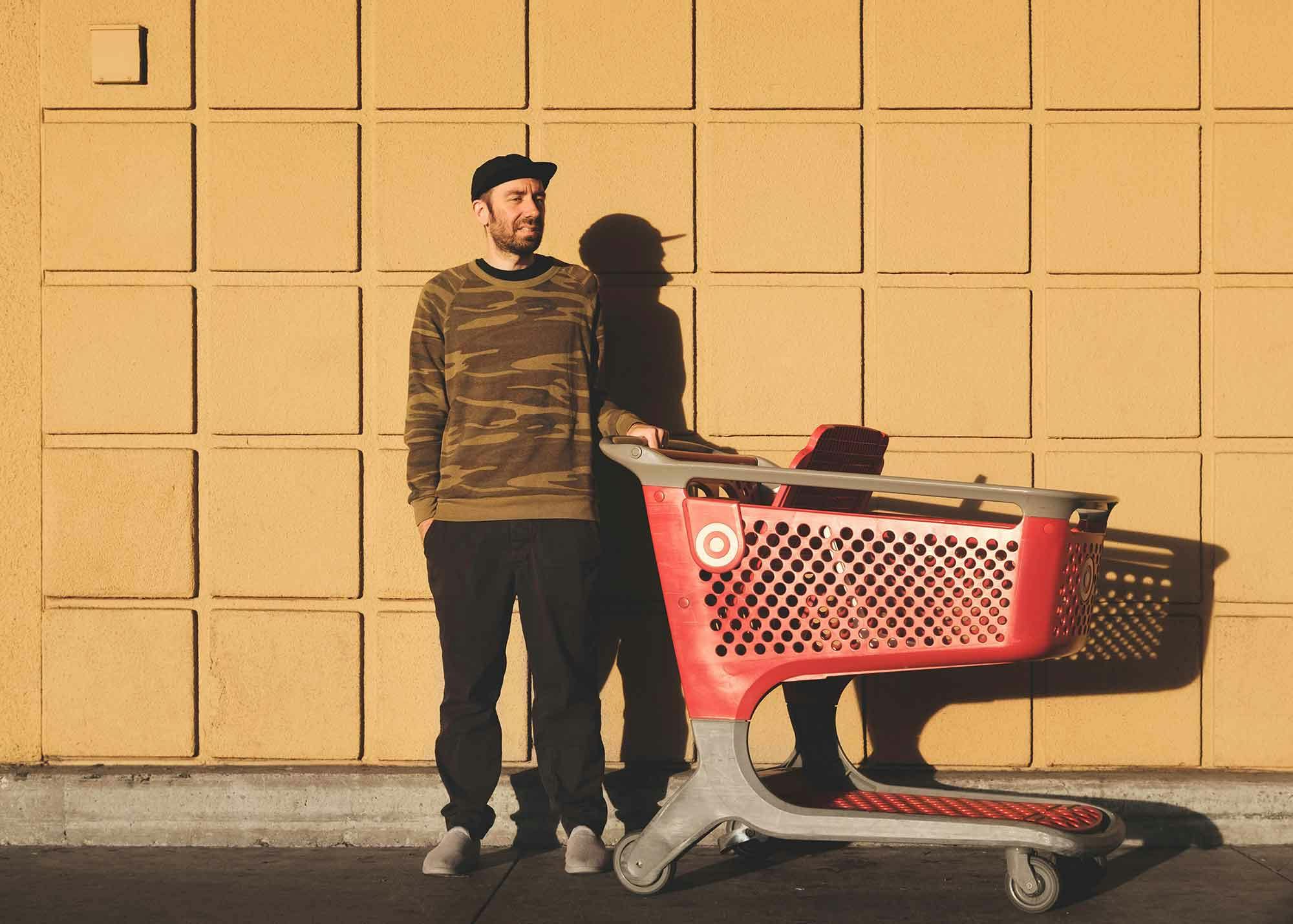 Yuppie pushing a Target cart