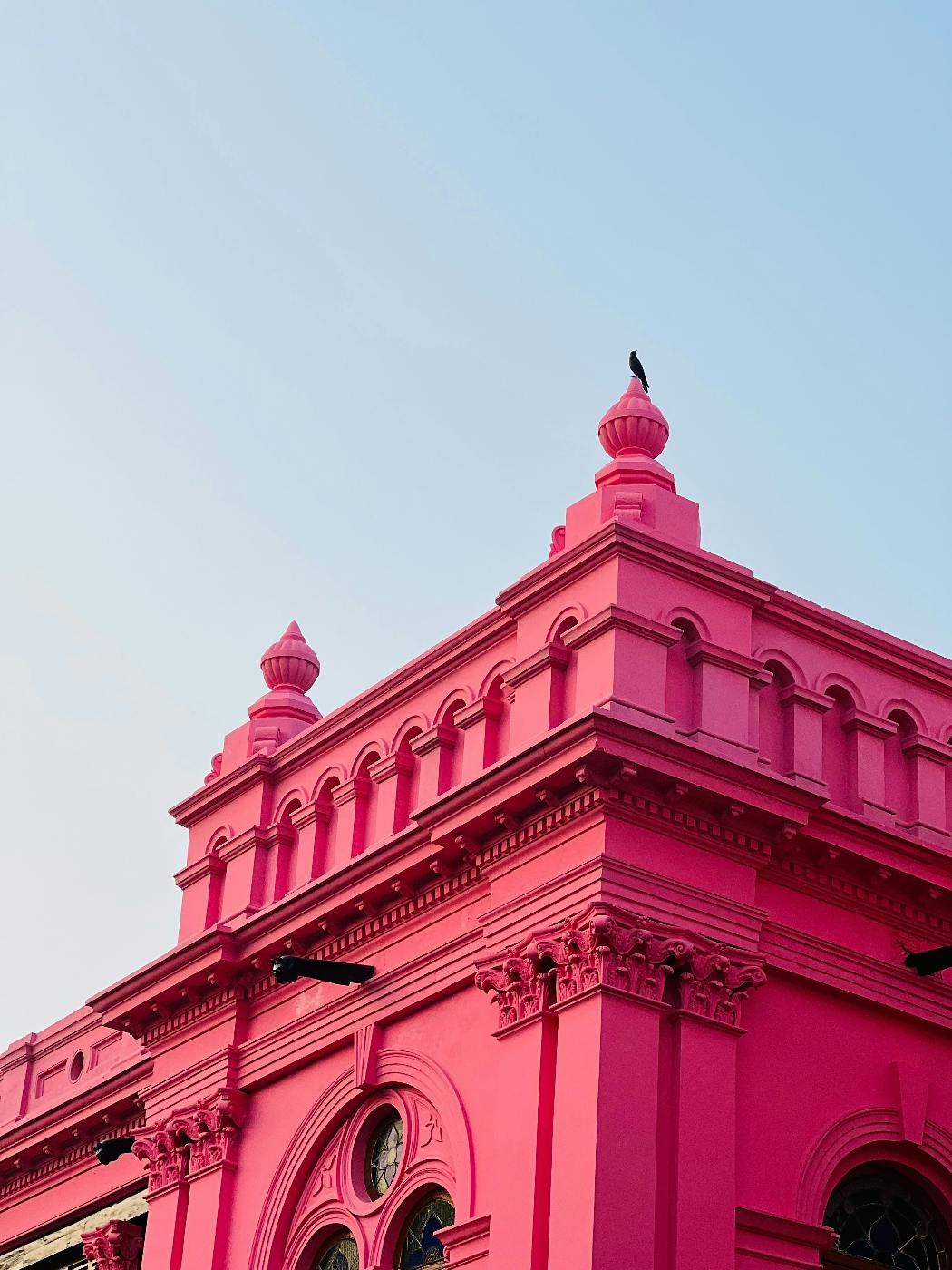 A pink building of Middle Eastern design