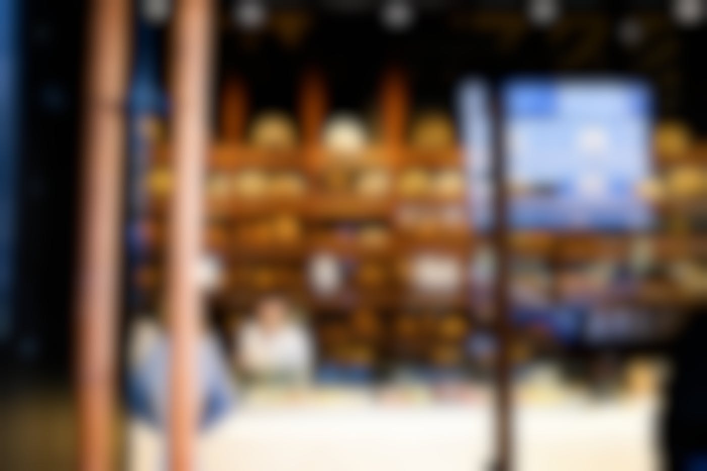 A view into a bakery with bread on shelves