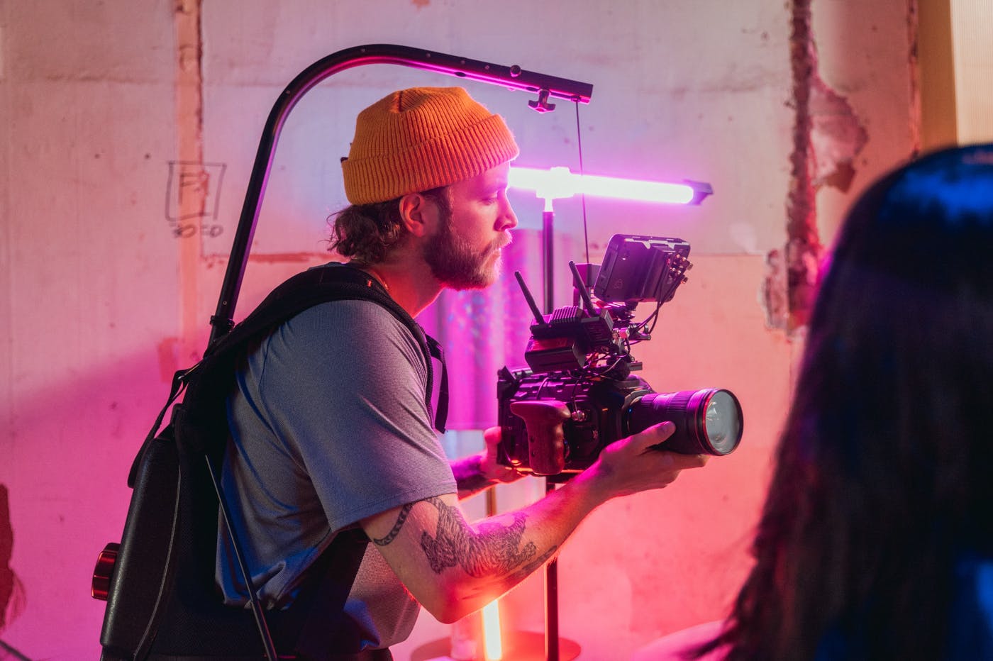 a camera man using a steady cam set up