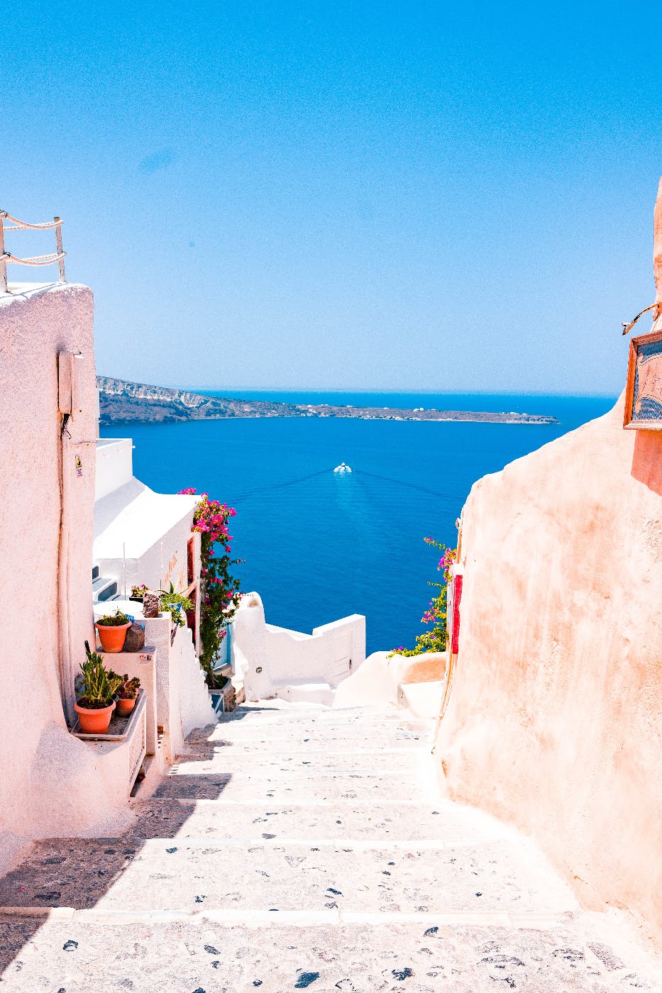 White stucco buildings overlooking an azure sea
