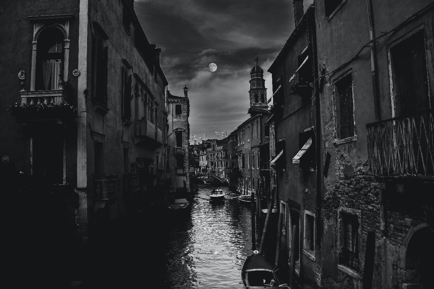 The moon over a canal in Venice, Italy