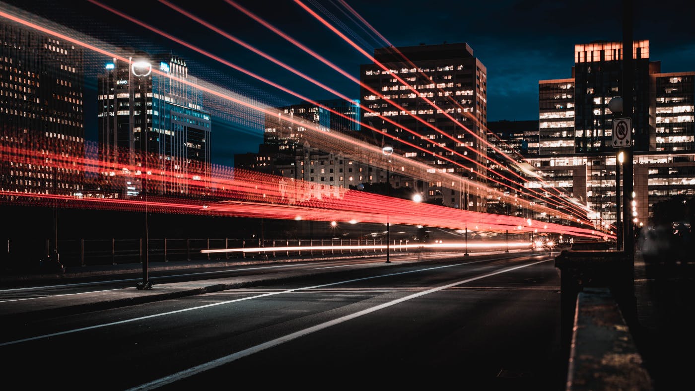 Long exposure of a city highway with cars 