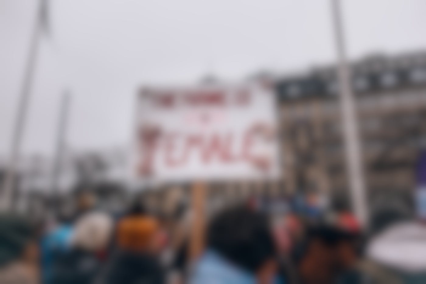 A women's match and sign reading The Future is Female