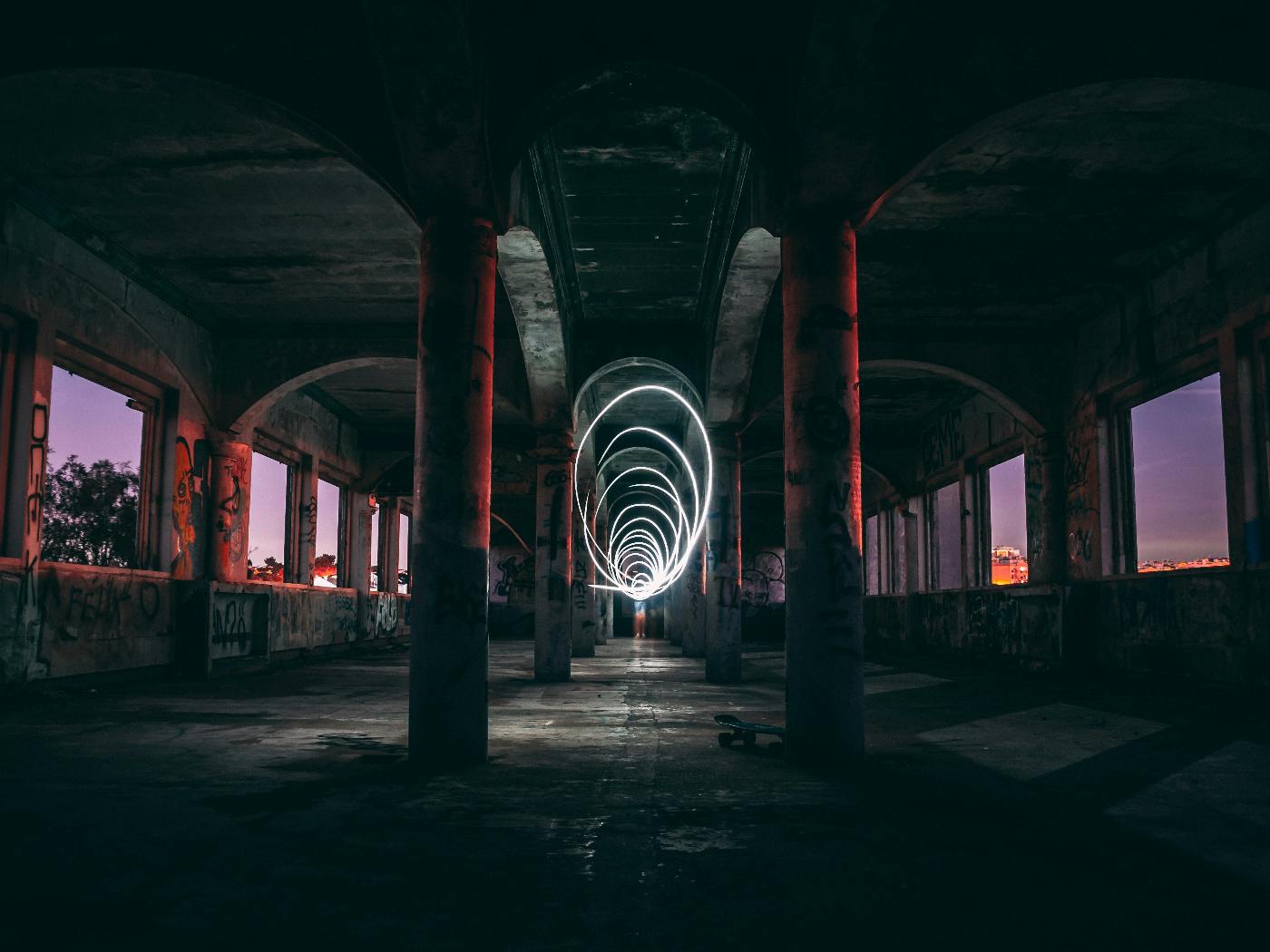 A long exposure of a tunnel in the middle of a building