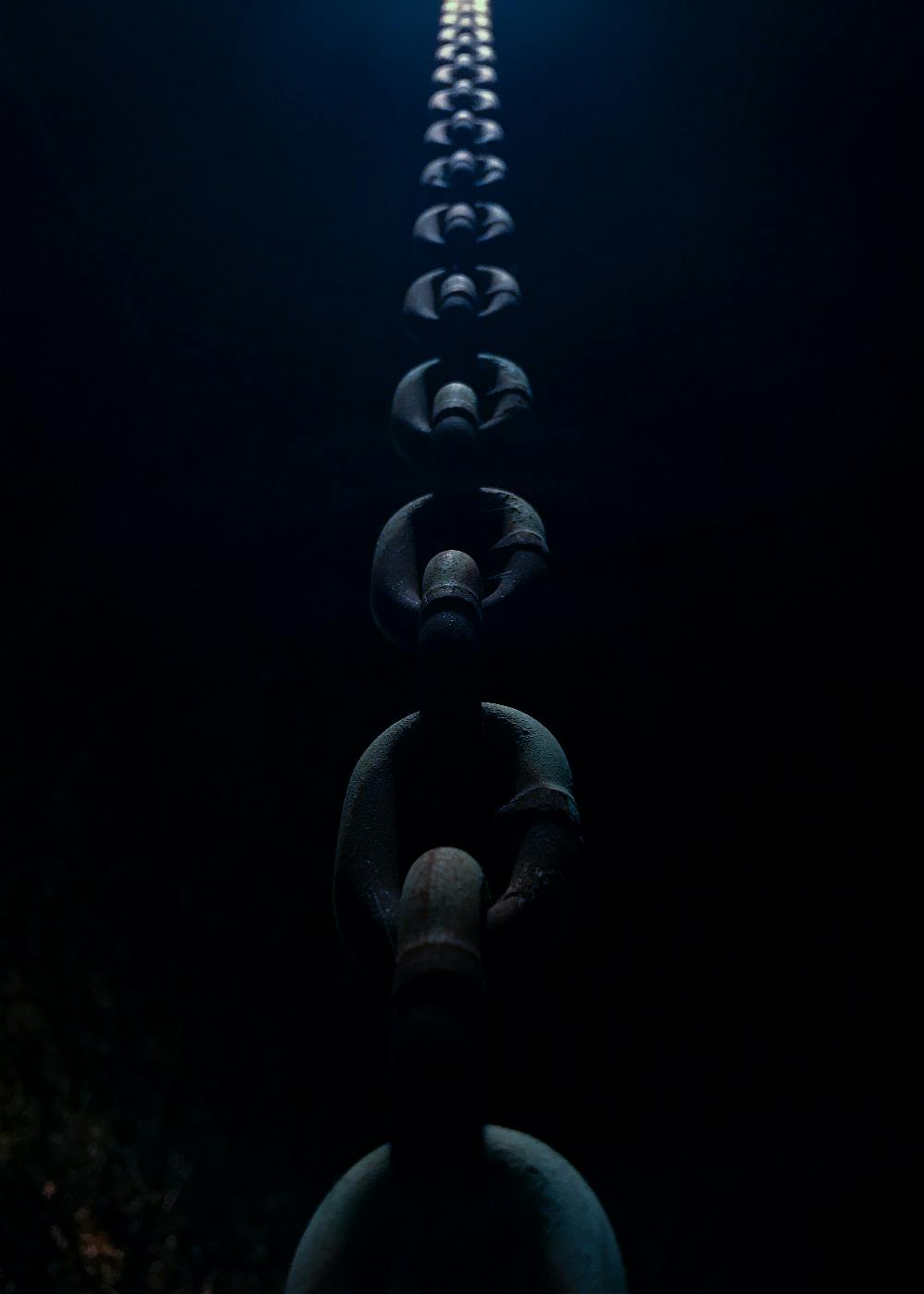 Giant anchor chain links in the deep ocean