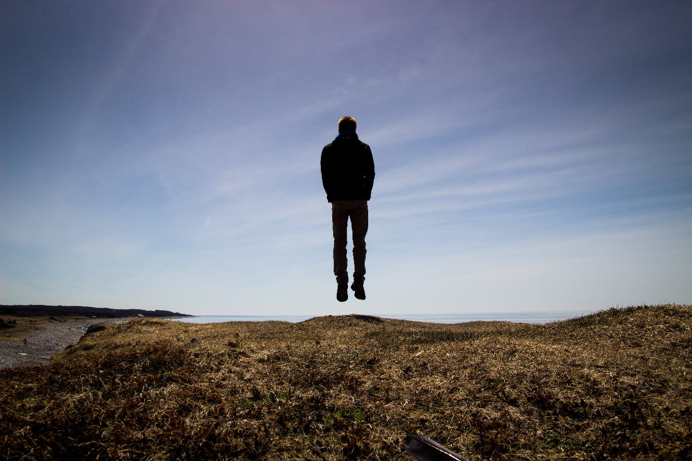 a man seemingly floating above the ground