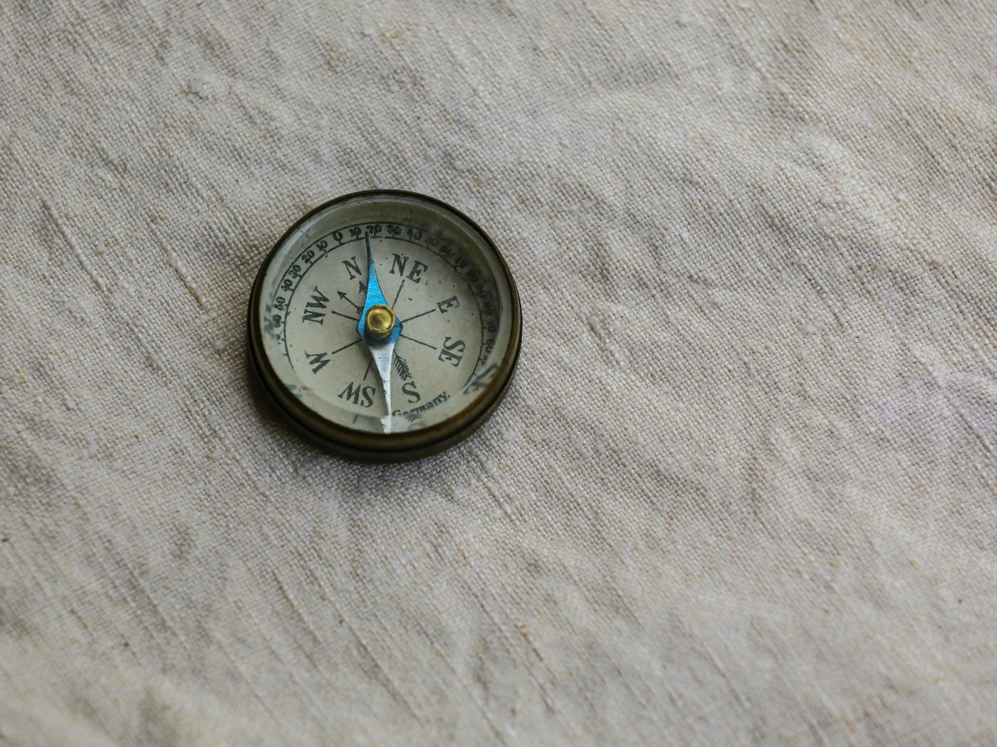 A compass on linen