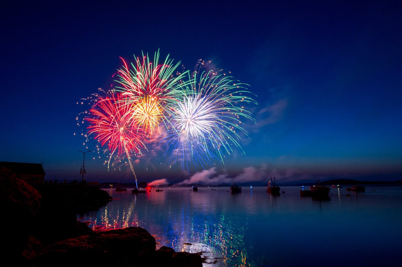 Fireworks over a harbor