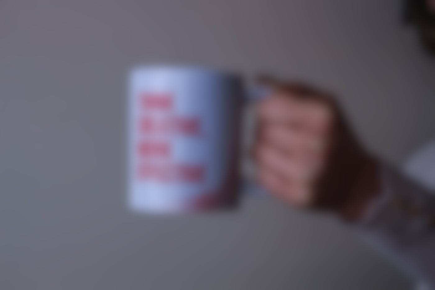 A coffee mug with think creative work effective on it
