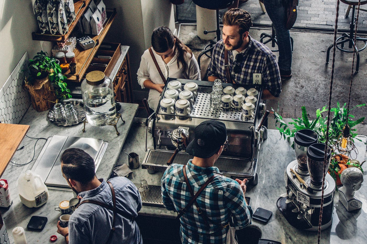 an overhead view of the counter at a coffee shop