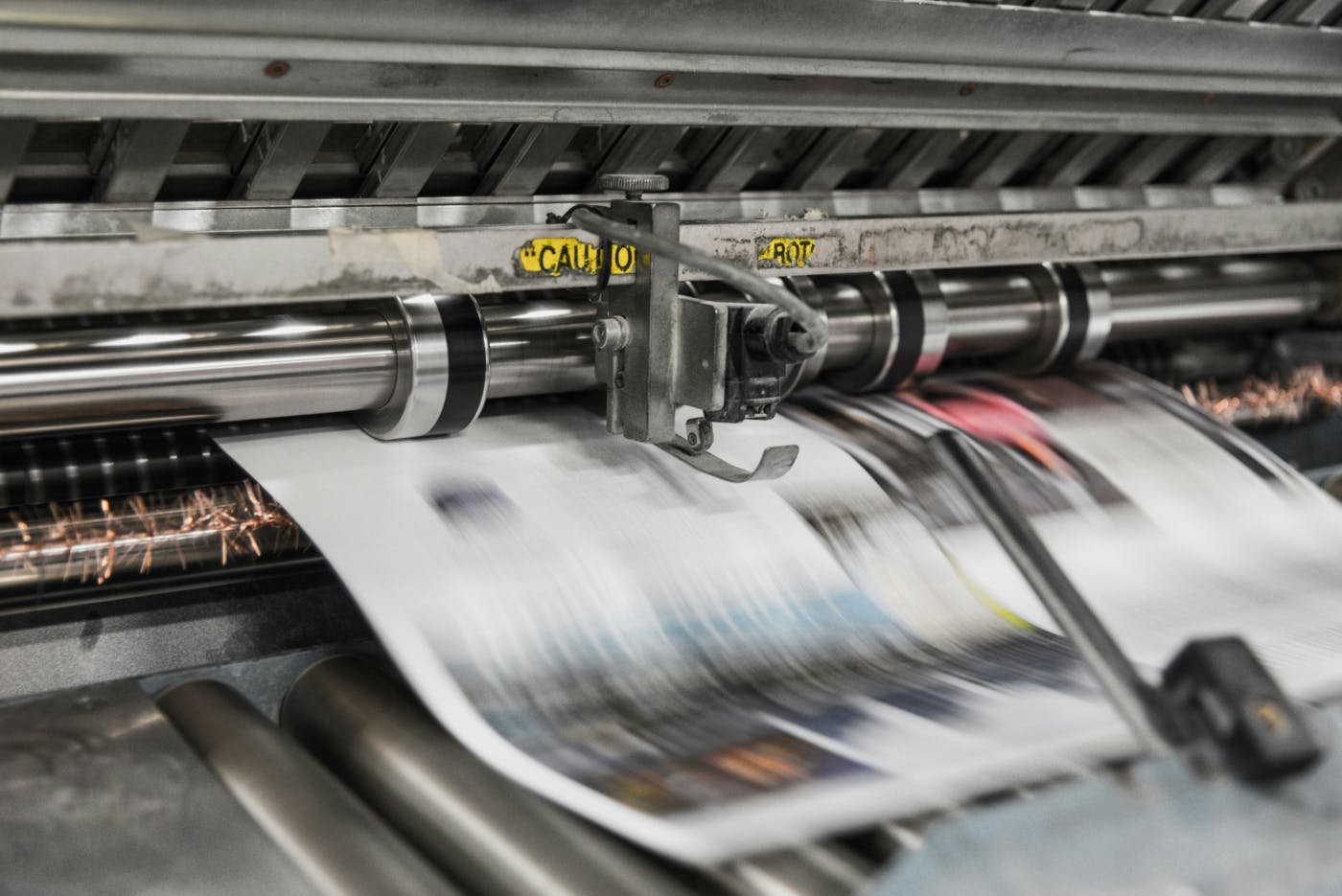 Newspapers on the press