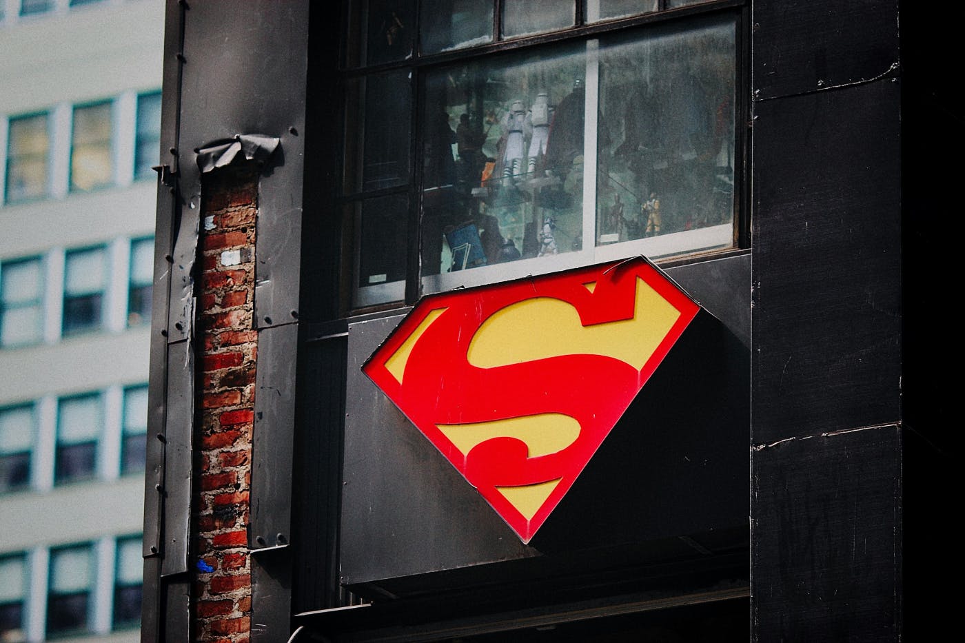 The Superman symbol on the side of a beat up building