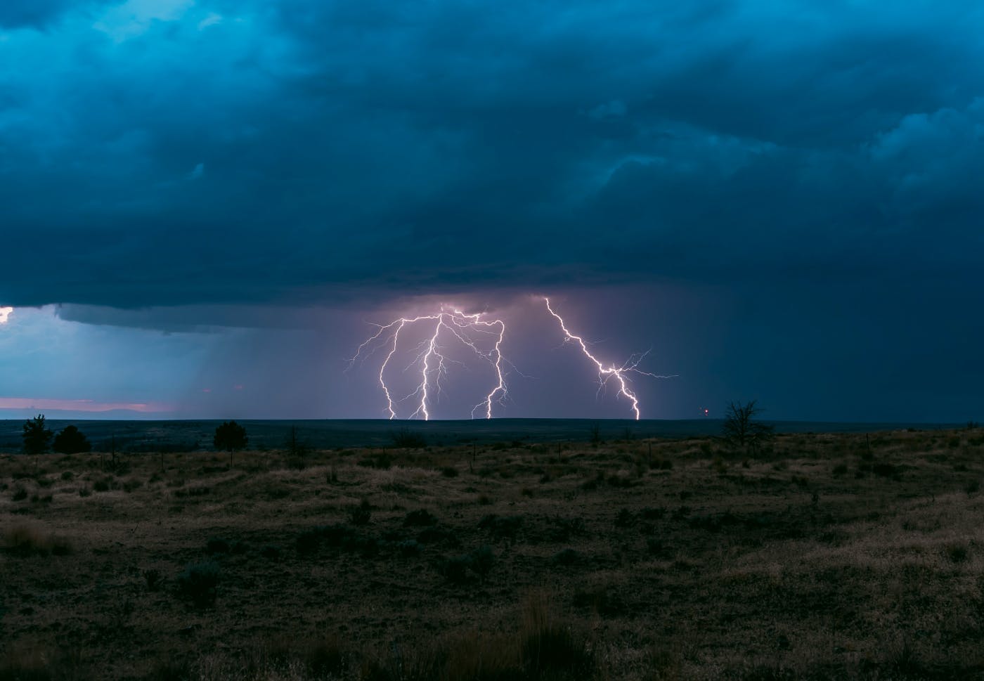 Lightning striking the desert at night