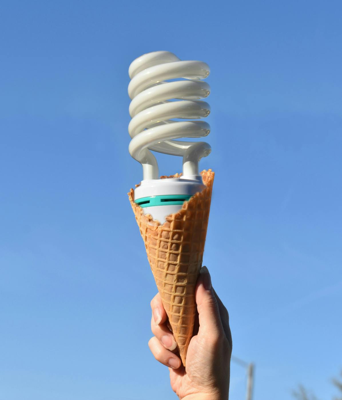 A white CFL bulb in a waffle cone