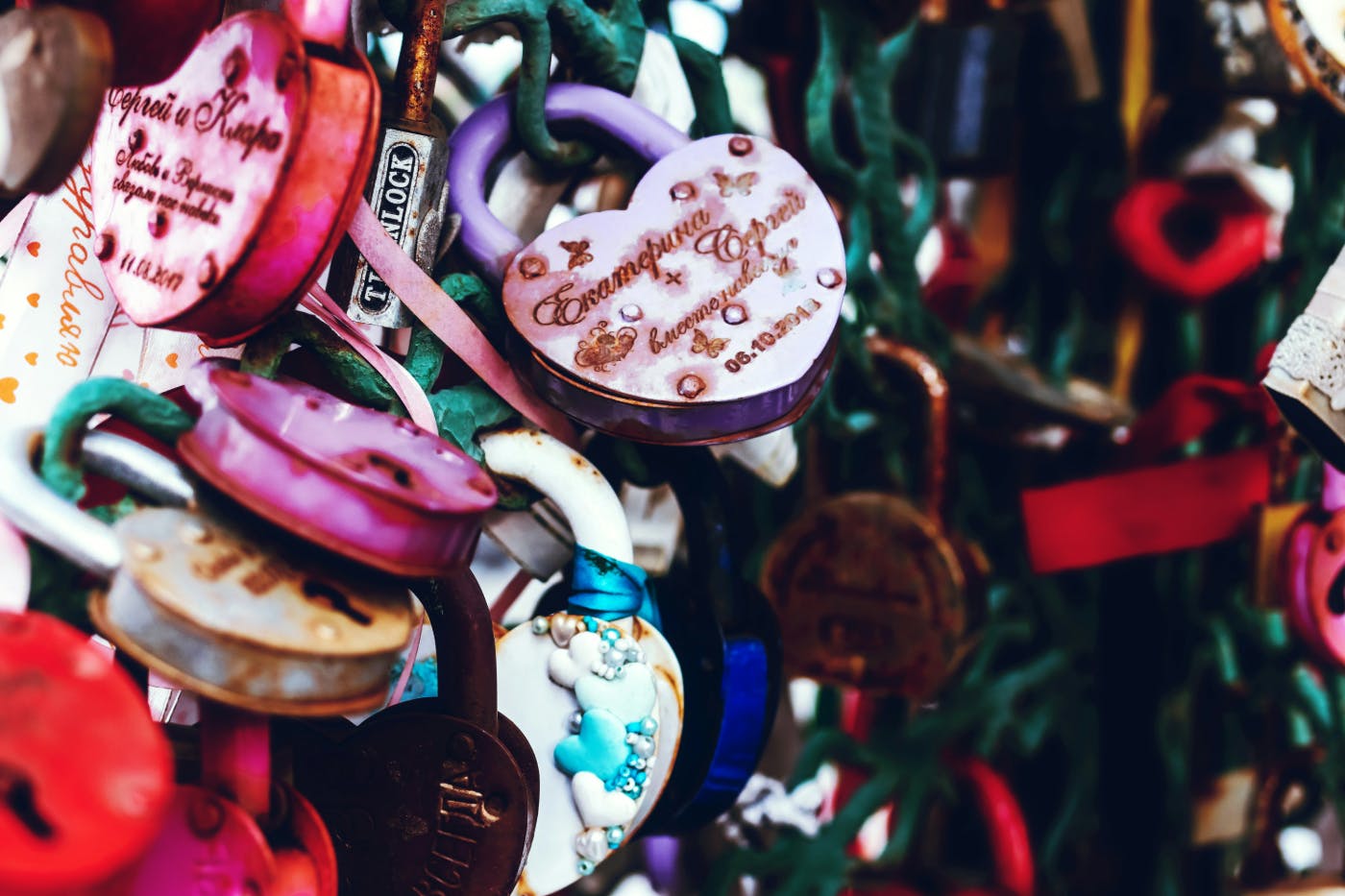 Many heart shaped padlocks on the Pont Des Arts in Paris