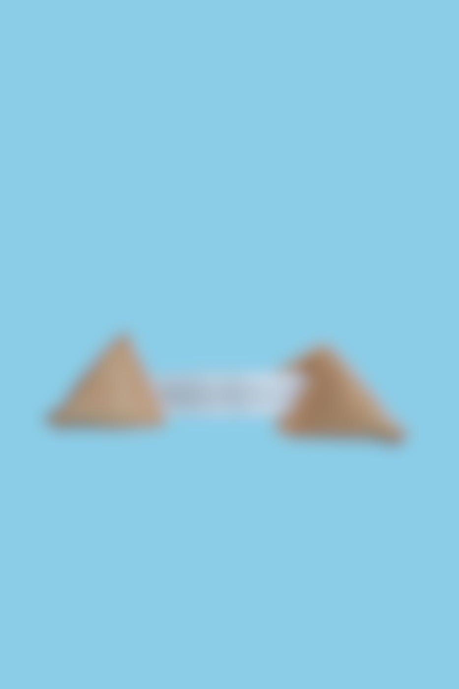 A split fortune cookie with the fortune reading: A plan you've been working on for a long time is beginning to take shape