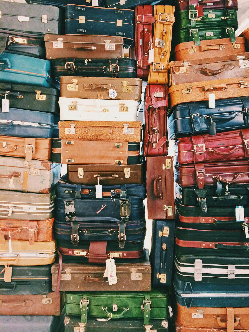Tall stacks of suitcases