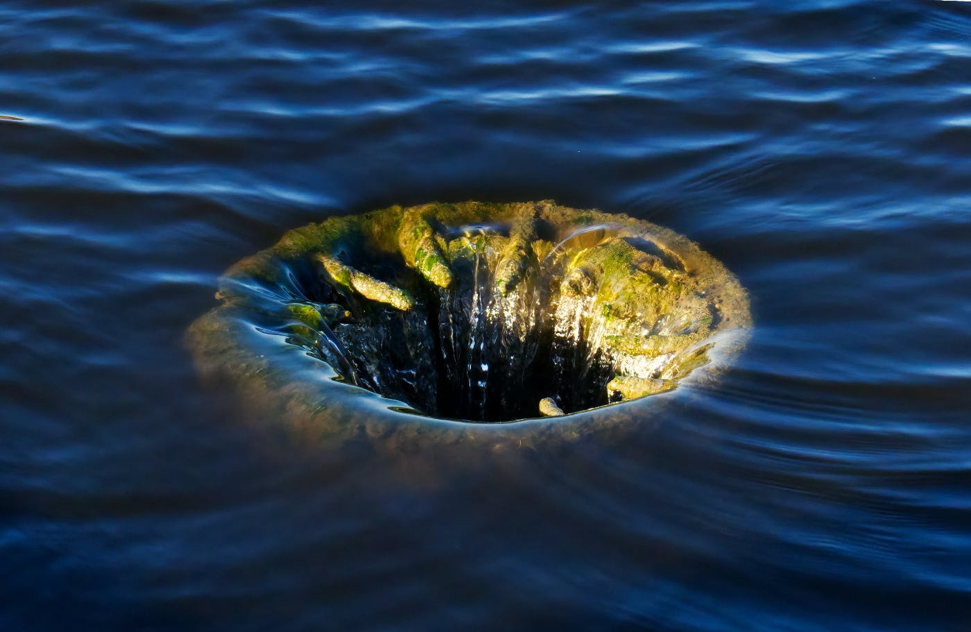 A sink hole in a body of water