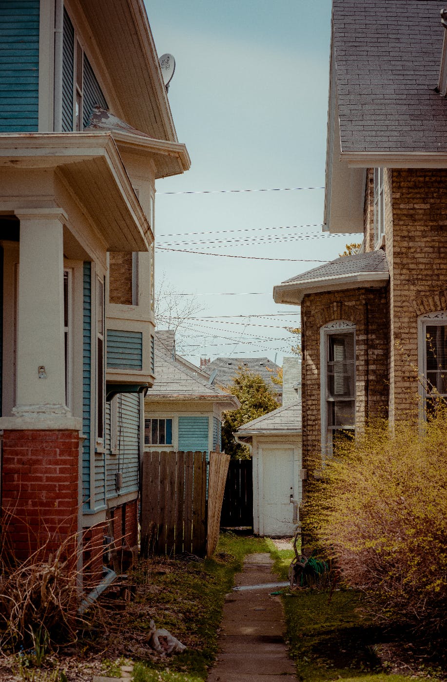 An alley between two older houses