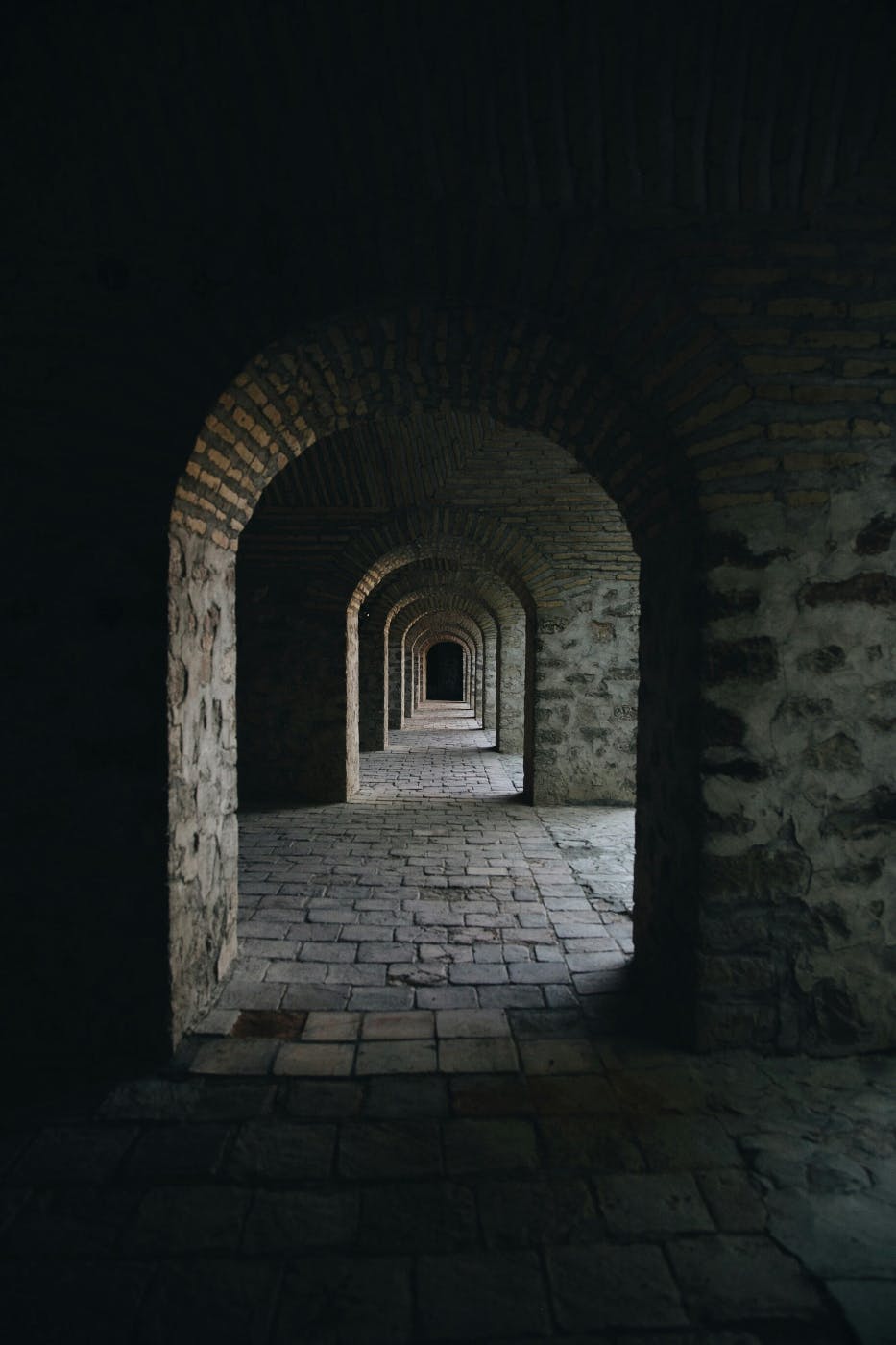 A shot through consecutive stone archways