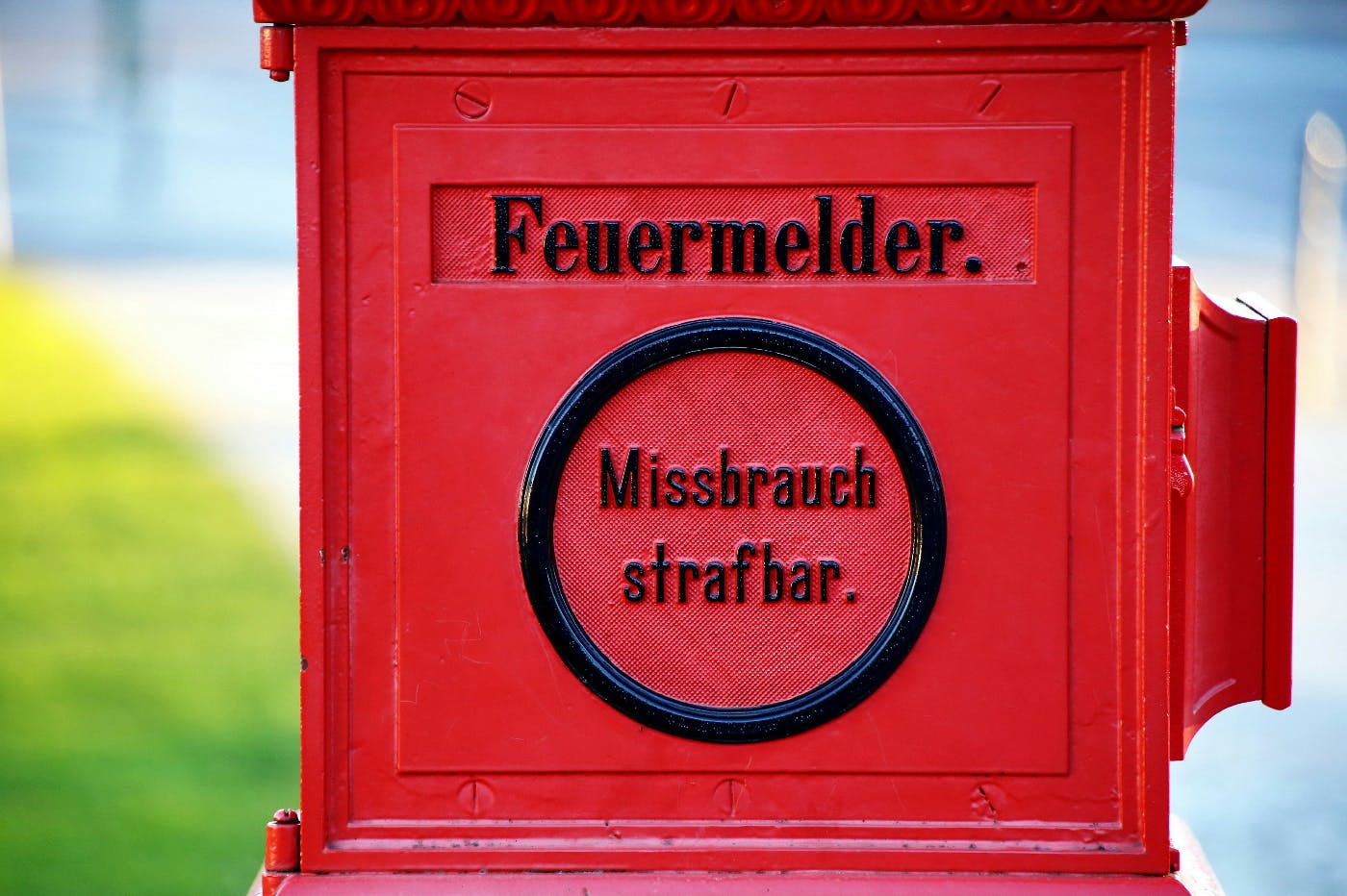  red firebox with Abuse is Punishable written on it on German