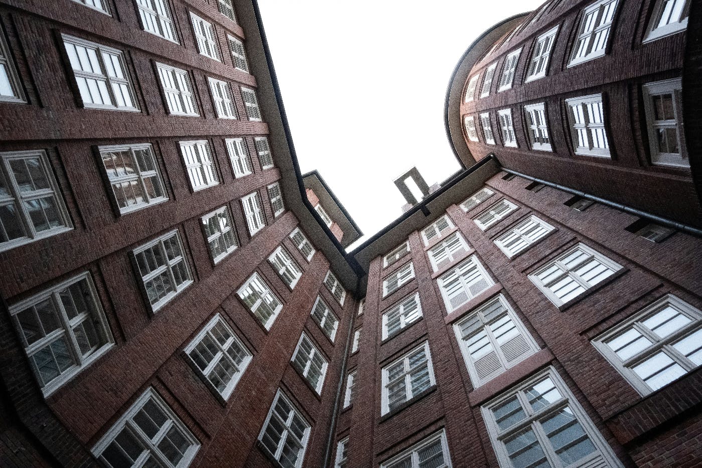 Looking up at buildings from a courtyard