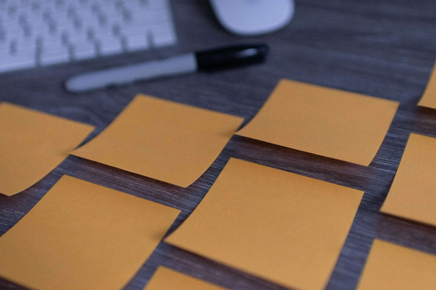 A table almost completely covered with orange sticky notes