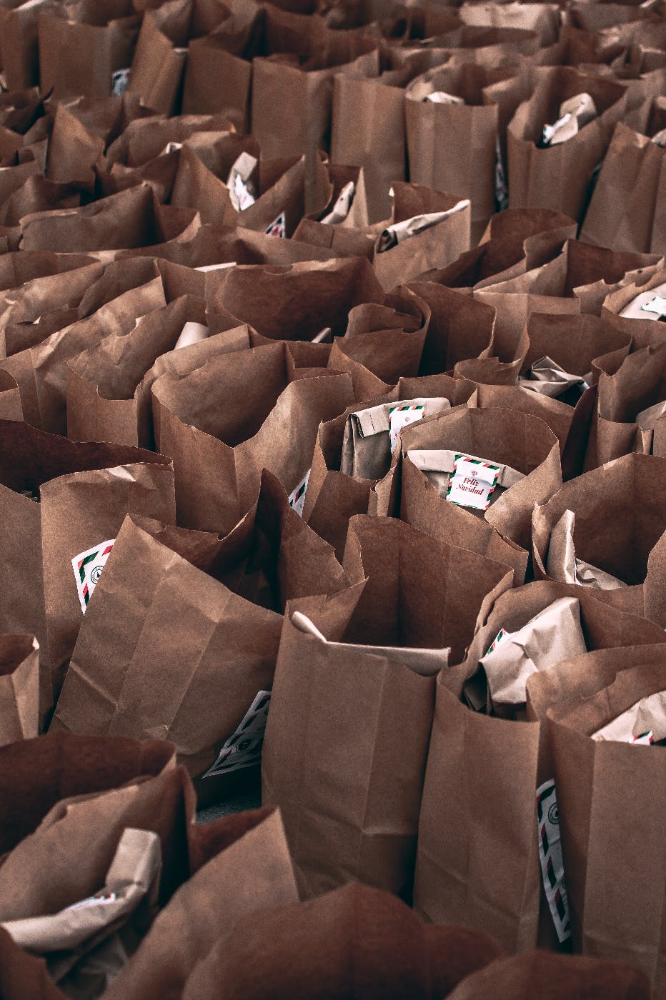 Full brown paper bags at a food bank