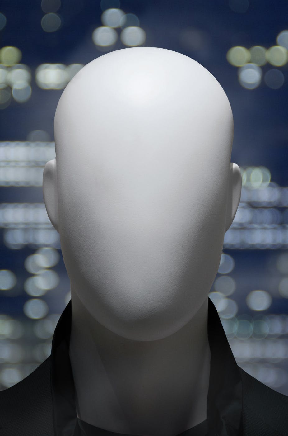 A blank, white mannequin head
