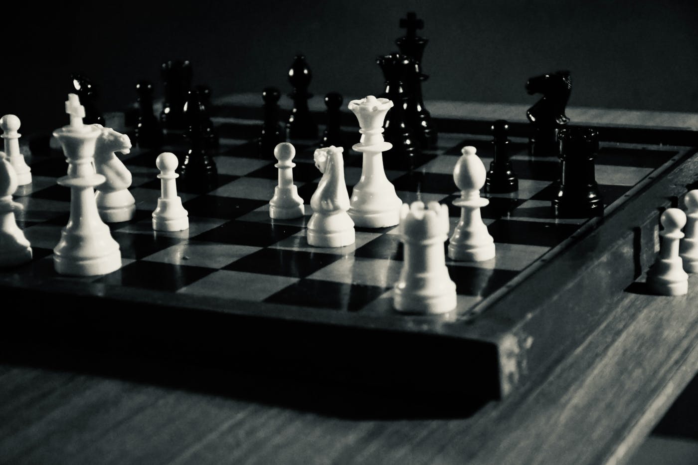 gray scale of a chessboard mid game