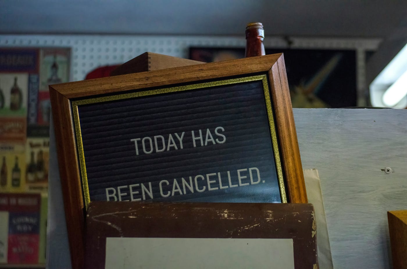 A sign in a shop reading Today Has Been Canceled