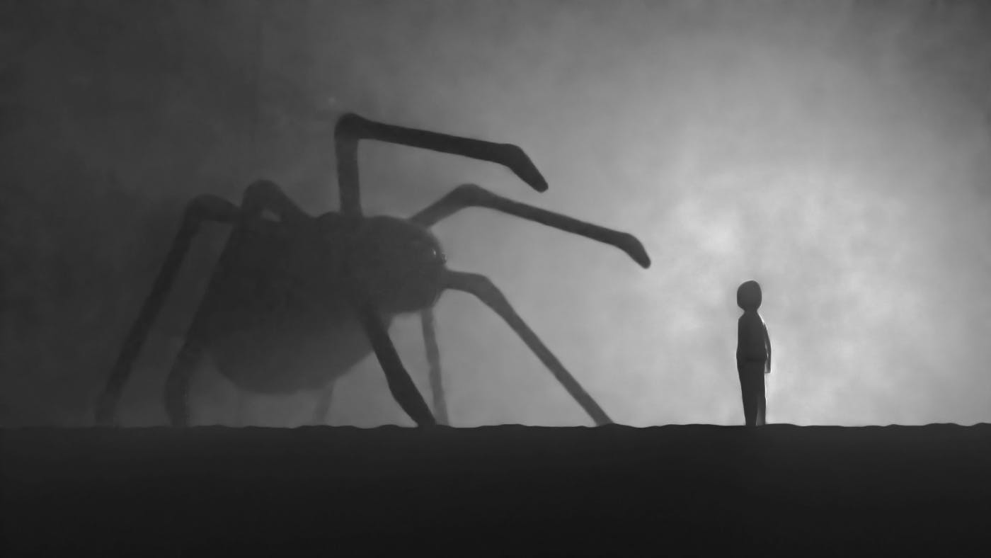 A foggy image of a person standing before a giant spider