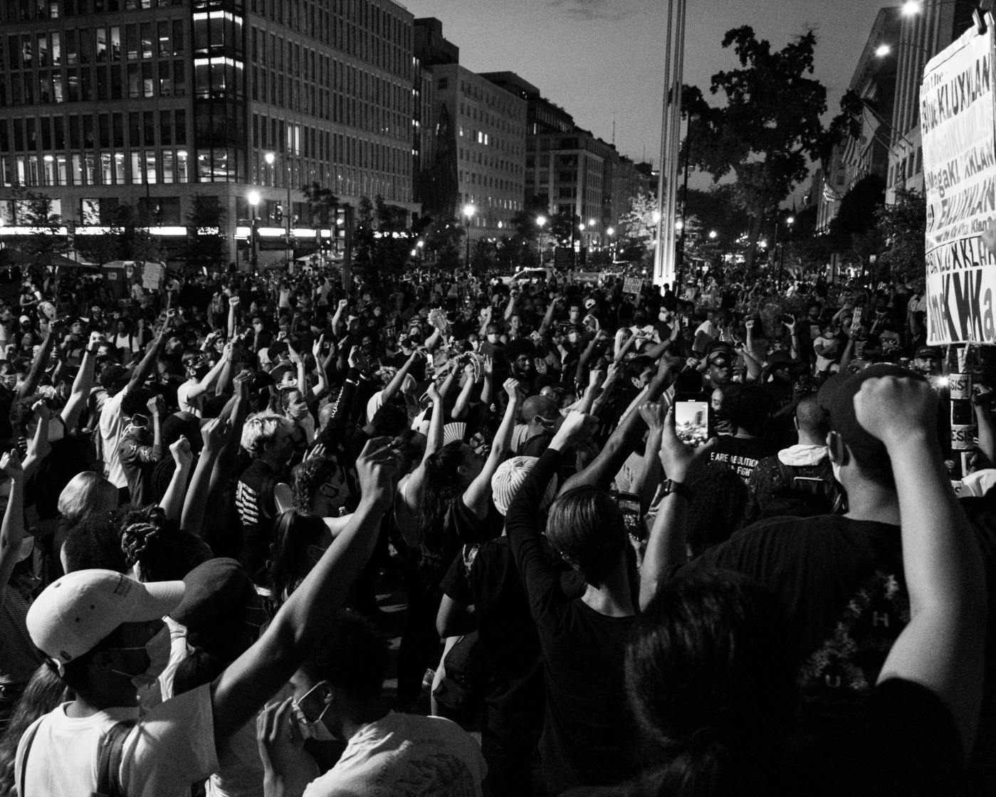 Black and white of thousands of people at a protest