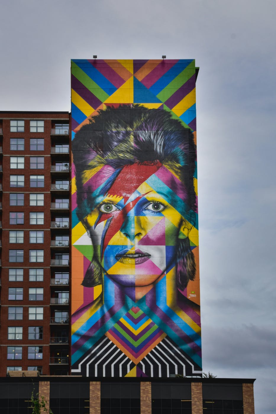 The side of a building with a giant abstract portrait of Bowie