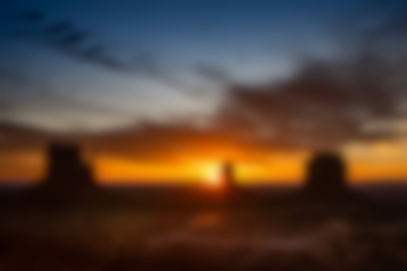 The sun setting on Monument Valley, Arizona