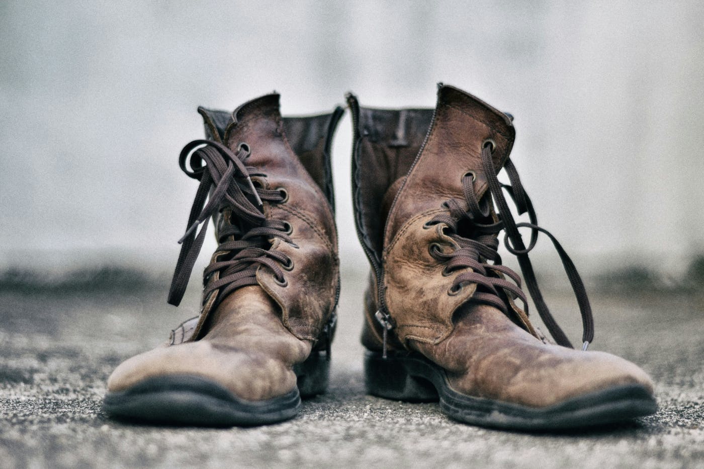 A pair of well worn leather boots