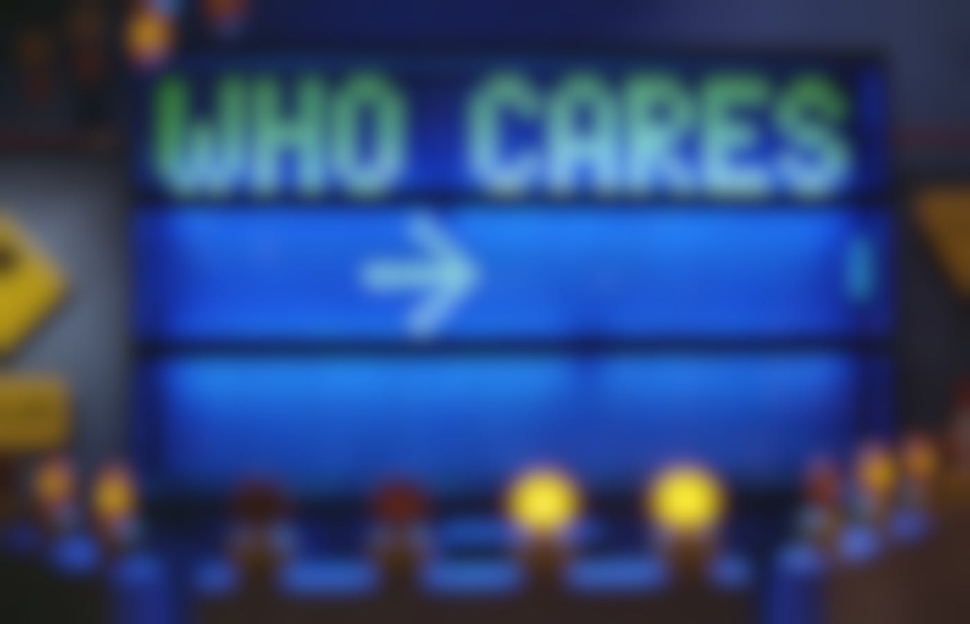 a flashing street sign reading "Who cares"