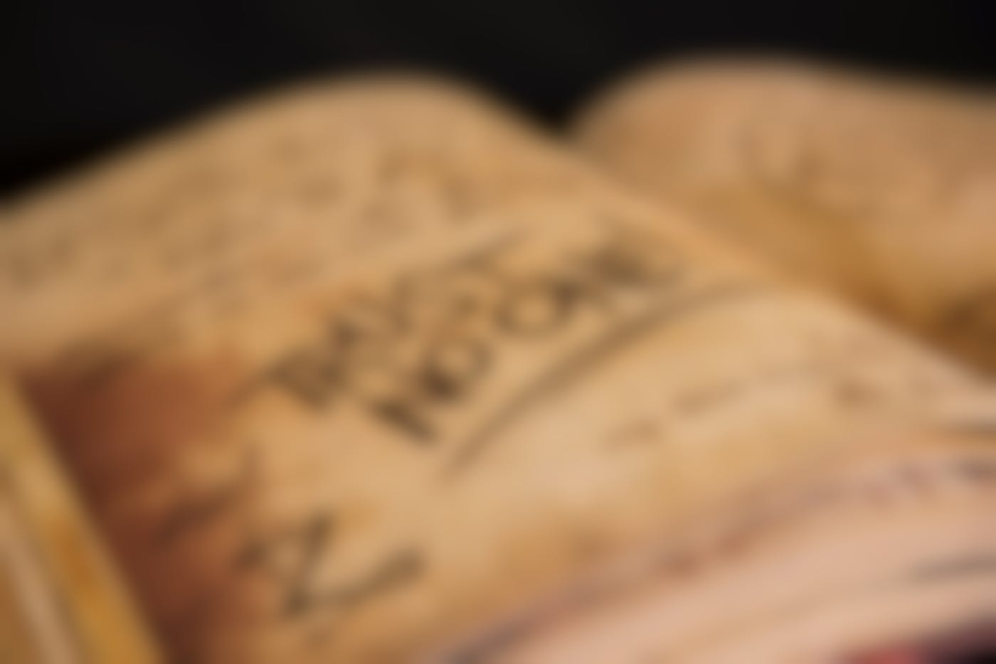 An open book with the words Trust No One in large letters