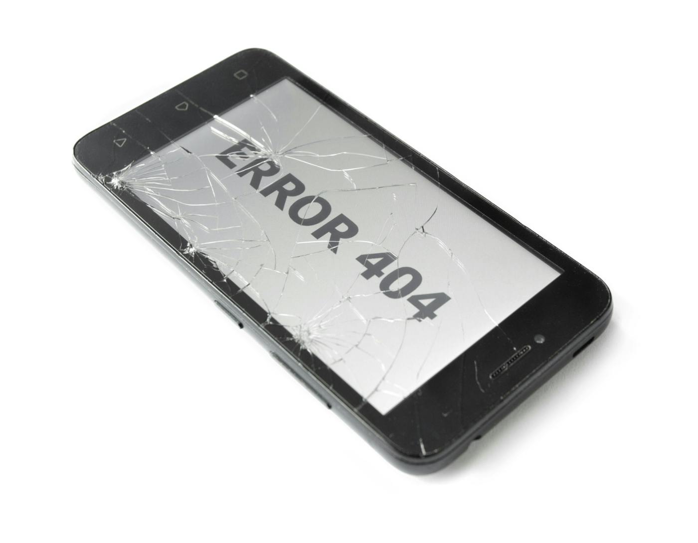 Smartphone with cracked screen and an error 404 message