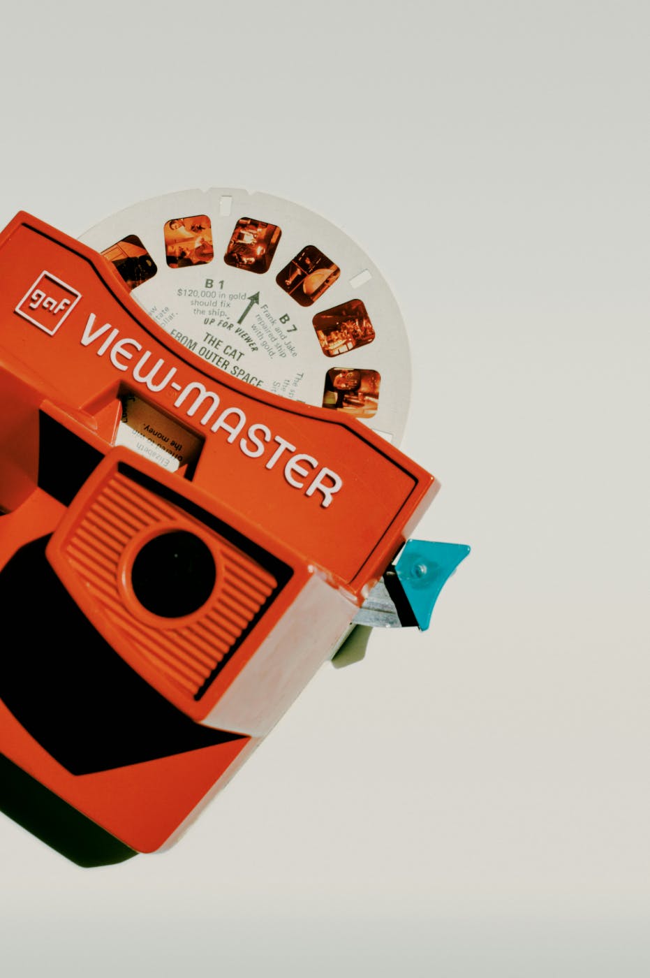 A classic red View master with a picture disc