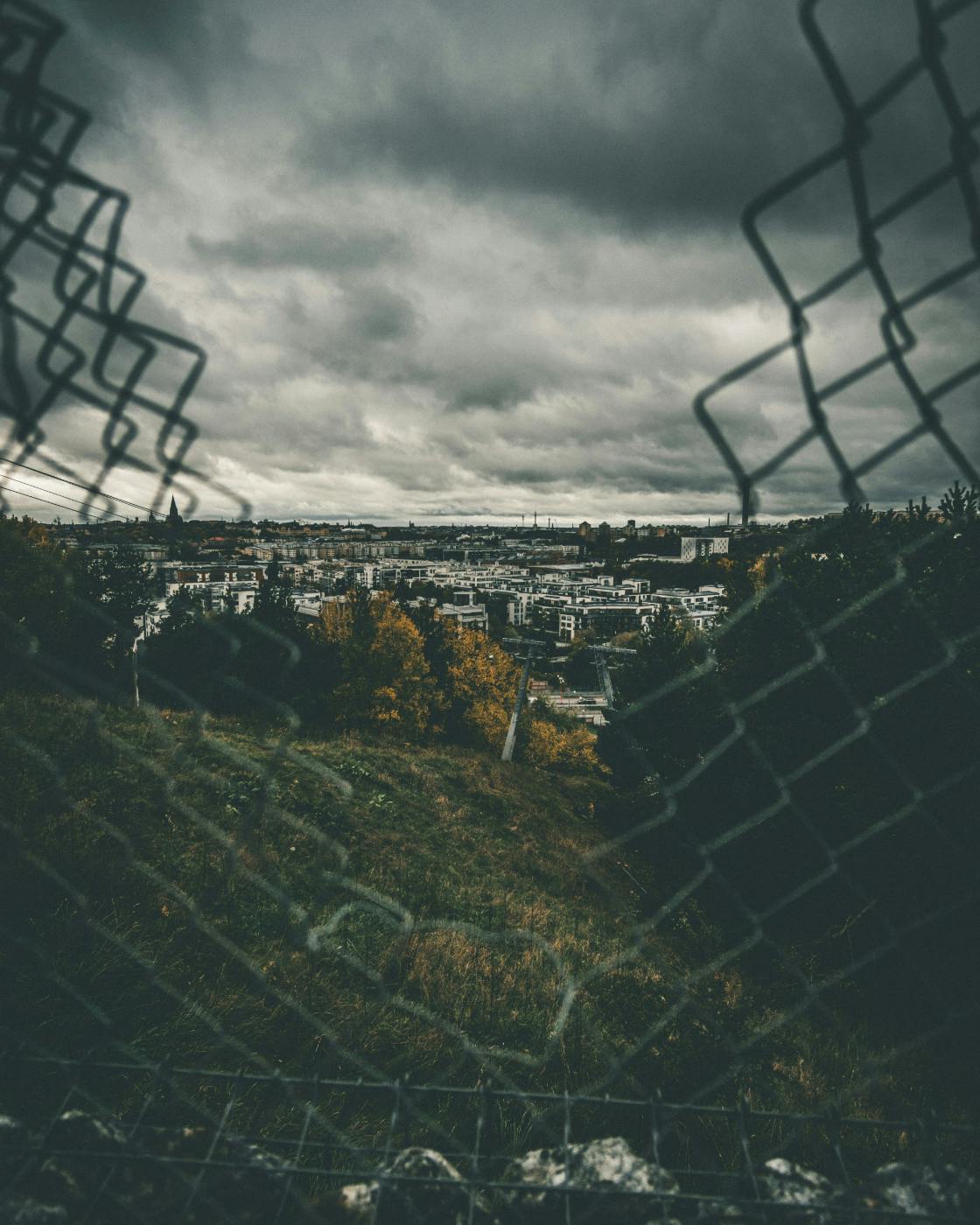 A view of Stockholm through a broken hurricane fence