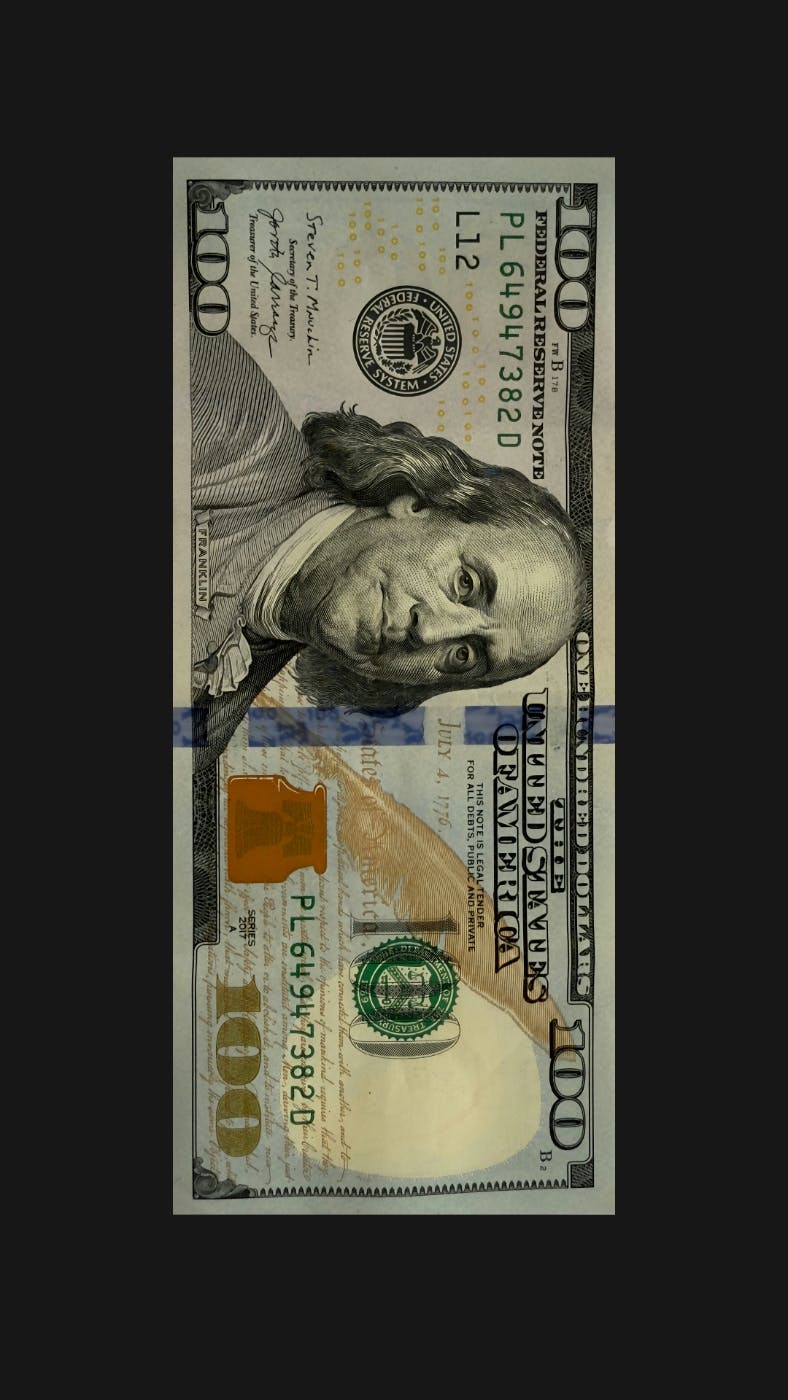 A fake 100 dollar bill