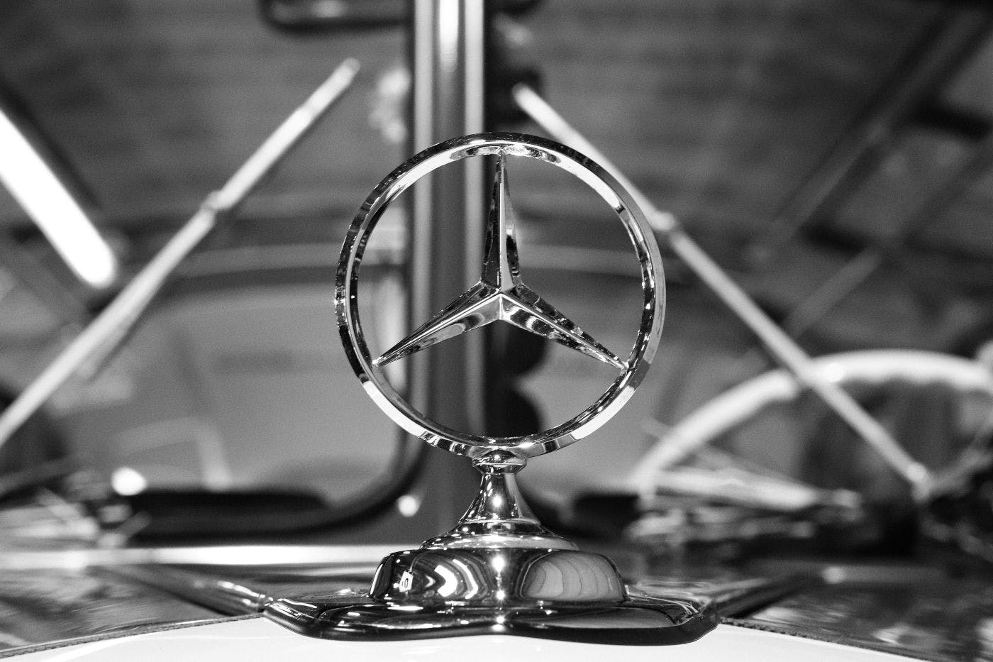 Black and white a Mercedes Benz hood ornament