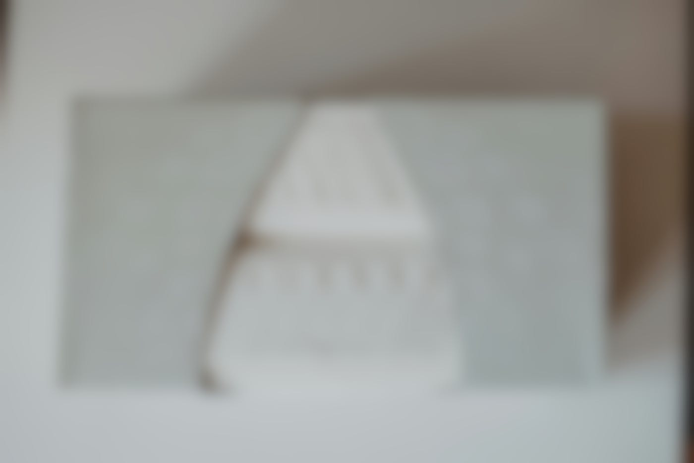 a gray box of facial tissues