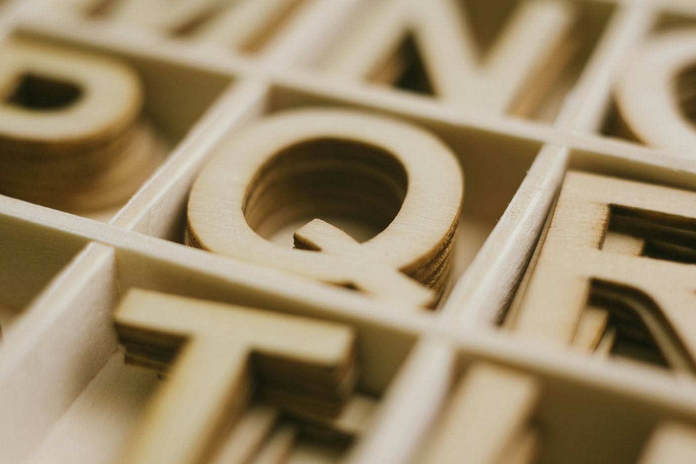 wooden letters in a box