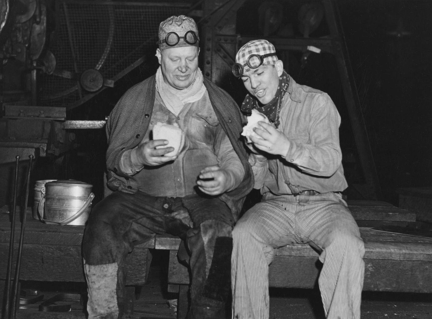 Two miners eating their lunch